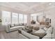 Spacious living room features coffered ceilings and large windows allowing for plenty of natural light at 1378 Cedardale Ln, Denver, NC 28037
