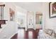 Bright entryway boasting hardwood floors, white trim, and direct access to the living spaces at 15402 Country Lake Dr, Pineville, NC 28134