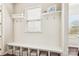 Mudroom features built-in bench, cubbies, and storage solutions, perfect for organization at 15402 Country Lake Dr, Pineville, NC 28134