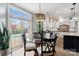 Bright dining area adjacent to the kitchen, featuring a view of the pool and offering seamless indoor-outdoor living at 1736 Cavendale Dr, Rock Hill, SC 29732