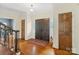 Inviting foyer with hardwood floors, a staircase, and a striking double-door entrance for a grand welcome at 1736 Cavendale Dr, Rock Hill, SC 29732