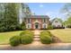 Charming brick home with a manicured front yard and a welcoming walkway, offering classic curb appeal at 1736 Cavendale Dr, Rock Hill, SC 29732