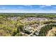 Aerial view shows a property's location in a neighborhood and surrounding landscape at 1840 Sapona Ct, Denver, NC 28037