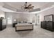 Spacious main bedroom featuring tray ceilings, ceiling fan and plush carpet at 1840 Sapona Ct, Denver, NC 28037