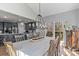 The dining room is open to the kitchen and has an abundance of natural light at 1840 Sapona Ct, Denver, NC 28037