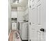 The laundry room features a new washer, dryer, sink, and cabinets at 1840 Sapona Ct, Denver, NC 28037
