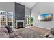 Bright living room with fireplace, TV, and comfortable seating at 1840 Sapona Ct, Denver, NC 28037