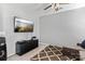Cozy living room with entertainment center, comfortable seating, and carpeted floor at 1840 Sapona Ct, Denver, NC 28037