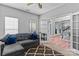 Relaxing living room with sofa, open doorway and natural light at 1840 Sapona Ct, Denver, NC 28037