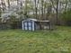 View of backyard featuring shed and grass yard, ideal for outdoor activities at 2021 Hilton Way Rd, Lancaster, SC 29720
