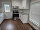 Bright kitchen featuring stainless steel range, white cabinets, and granite counters at 2021 Hilton Way Rd, Lancaster, SC 29720