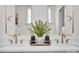 Stylish bathroom with double sink vanity, elegant mirror, and modern fixtures at 221 Davidson Gateway Dr, Davidson, NC 28036