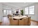 Inviting dining area with a dining table and chairs, seamlessly connected to the living room at 221 Davidson Gateway Dr, Davidson, NC 28036