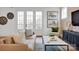 Inviting living room with a comfortable couch, decorative pillows, and elegant decor accents at 221 Davidson Gateway Dr, Davidson, NC 28036