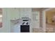 Functional kitchen with white cabinets and basic appliances at 224 Mcclain St, York, SC 29745