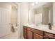 Bathroom featuring granite countertops, wooden cabinets, and modern fixtures at 2332 Paddlers Cove Dr, Lake Wylie, SC 29710
