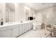Luxurious bathroom with double vanity, soaking tub and walk-in shower with marble tile surround at 2332 Paddlers Cove Dr, Lake Wylie, SC 29710