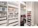 Well-organized closet with shelves and storage solutions for clothes, shoes, and accessories at 2332 Paddlers Cove Dr, Lake Wylie, SC 29710