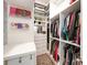 Walk-in closet with custom shelving and storage, designed to maximize space and organization at 2332 Paddlers Cove Dr, Lake Wylie, SC 29710