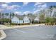 Charming community clubhouse with ample parking, and secure access, creating a welcoming space for residents at 2332 Paddlers Cove Dr, Lake Wylie, SC 29710