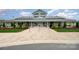 Modern community center featuring a welcoming entrance, well-maintained landscaping, and a paved brick approach at 2332 Paddlers Cove Dr, Lake Wylie, SC 29710
