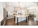 Modern kitchen with stainless steel appliances, light cabinetry, an island, and hardwood floors at 2332 Paddlers Cove Dr, Lake Wylie, SC 29710