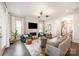Inviting living room with comfortable seating, modern fireplace, and stylish decor at 2332 Paddlers Cove Dr, Lake Wylie, SC 29710