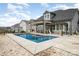 Backyard pool and spa with professional landscaping at 2332 Paddlers Cove Dr, Lake Wylie, SC 29710