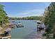 Scenic waterfront featuring private boat slips, covered docks, and open lake access at 2792 Lakeshore Rd, Denver, NC 28037