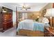 Comfortable main bedroom with hardwood floors, decorative touches, and soft natural light at 2792 Lakeshore Rd, Denver, NC 28037