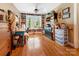 Bright home office with custom built-in bookshelves and hardwood floors at 2792 Lakeshore Rd, Denver, NC 28037