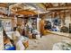 Unfinished basement offers generous storage space with a walkout to the backyard at 2792 Lakeshore Rd, Denver, NC 28037