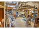 Unfinished basement offers ample storage space with exposed ductwork and concrete flooring at 2792 Lakeshore Rd, Denver, NC 28037