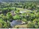 Beautiful aerial view of a community with mature trees and a large pond at 3017 Lynwood Dr, Lancaster, SC 29720