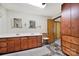 Bathroom with double vanity sinks and wood cabinetry at 3017 Lynwood Dr, Lancaster, SC 29720