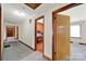 Hallway with access to several rooms and neutral colored carpet at 3017 Lynwood Dr, Lancaster, SC 29720