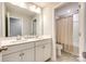 Bright bathroom with dual sinks, ample counter space, and a separate toilet room at 3021 Patchwork Ct, Fort Mill, SC 29708