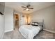 Bright bedroom with ceiling fan and cozy bed at 3021 Patchwork Ct, Fort Mill, SC 29708