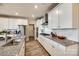 Spacious kitchen with granite countertops, white cabinetry, stainless steel appliances, and ample storage at 3021 Patchwork Ct, Fort Mill, SC 29708