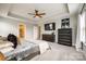 Comfortable main bedroom with a ceiling fan, neutral decor, and an ensuite bathroom at 3021 Patchwork Ct, Fort Mill, SC 29708