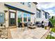 Relaxing outdoor patio features stylish furniture and a retractable awning for shade at 3021 Patchwork Ct, Fort Mill, SC 29708