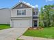 Charming two-story home with a two-car garage and well-maintained landscaping at 3034 Trailblazer St, Charlotte, NC 28215