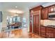 Open-concept dining room flowing into the kitchen features a dining table and seating for six at 310 Frontier Cir, Indian Trail, NC 28079