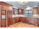 Spacious kitchen features a built-in refrigerator and stainless steel appliances, and custom cabinets at 310 Frontier Cir, Indian Trail, NC 28079