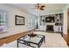 Spacious living room with built-in shelving, fireplace, and hardwood floors at 310 Frontier Cir, Indian Trail, NC 28079