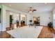Open-concept living space featuring hardwood floors and ample natural light at 310 Frontier Cir, Indian Trail, NC 28079