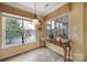 Cozy breakfast nook filled with natural light and views of the peaceful outdoor scenery at 44455 Oriole Dr # 100, Indian Land, SC 29707