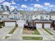 Charming townhomes feature brick accents, two-car garages, and well-maintained landscaping at 44455 Oriole Dr # 100, Indian Land, SC 29707
