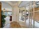 Bright home office featuring French doors and built-in shelves offers versatile workspace at 44455 Oriole Dr # 100, Indian Land, SC 29707