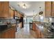 Spacious kitchen with stainless steel appliances, tile backsplash, and ample counter space at 44455 Oriole Dr # 100, Indian Land, SC 29707